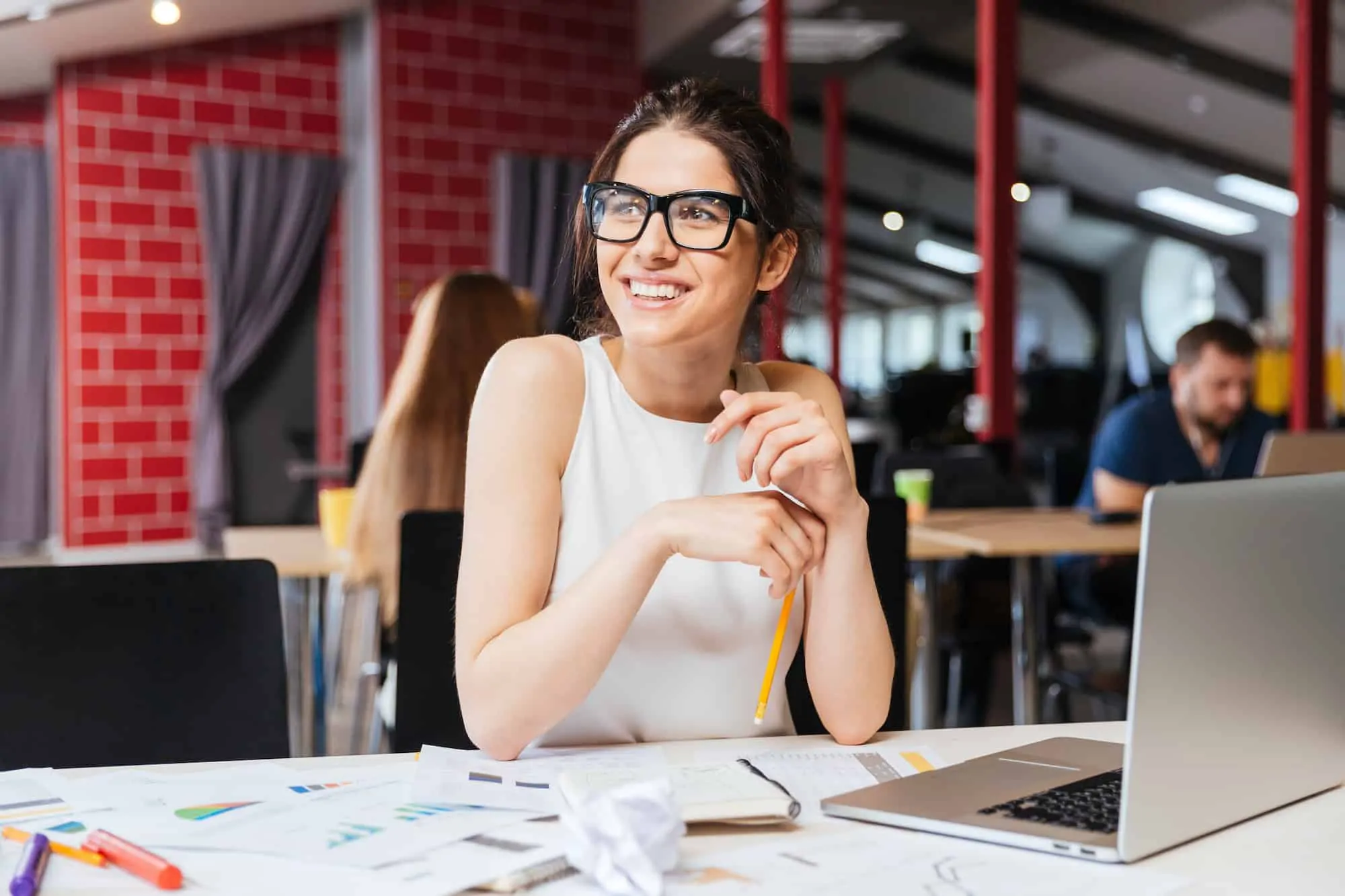 photo of woman working in cafe